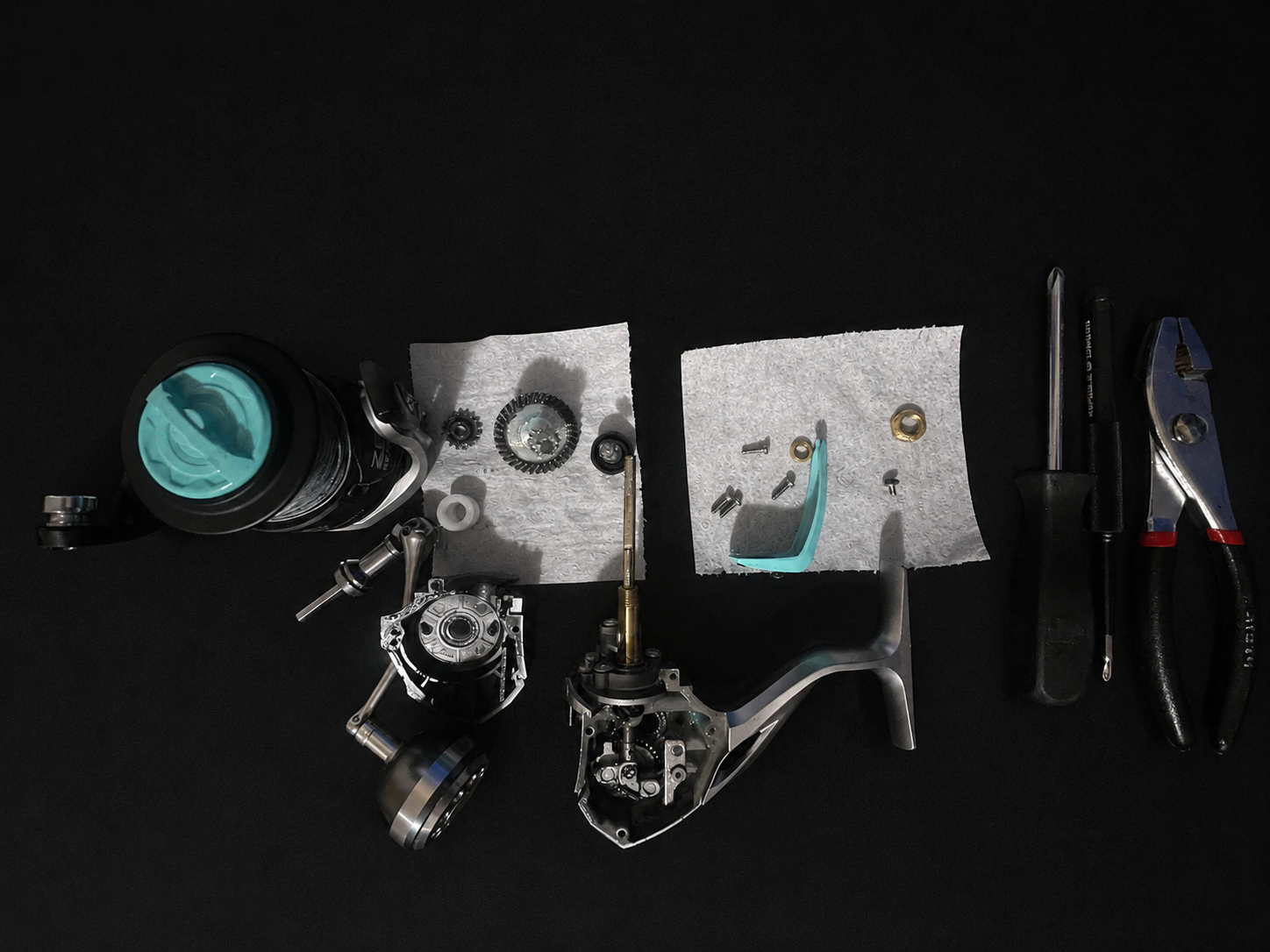 Complete reel tear-down with all parts laid out