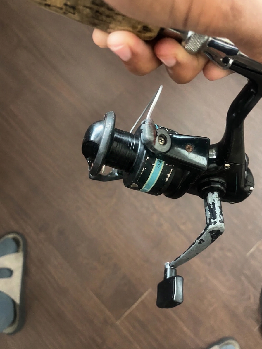 Corroded spinning reel before cleaning